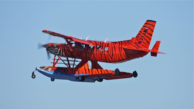 Quest Kodiak (N31JA) - A colorful KODIAK 100 climbs from Rwy 34L on 7.25.13. (Ser#100-0042).