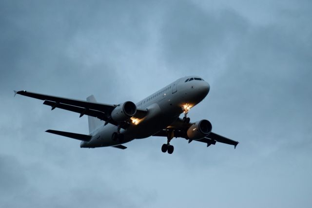 Airbus A319 (N612MX) - Landing at Belfast International at 1823L on Saturday, 12 March 2016