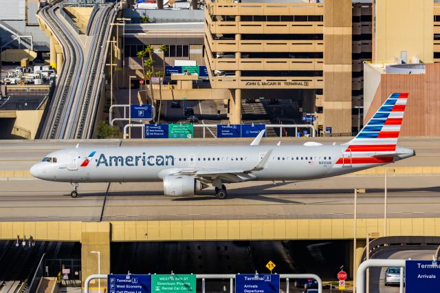 Airbus A321neo (N410AN) - An American Airlines A321 taxiing at PHX on 2/13/23, the busiest day in PHX history, during the Super Bowl rush. Taken with a Canon R7 and Canon EF 100-400 II L lens.