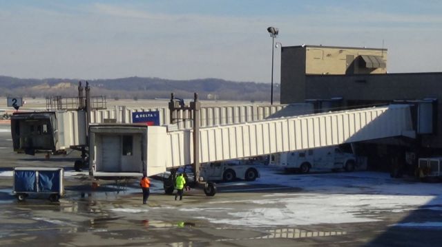 — — - Gate A1 being prepared for the arrival of Alaska 3468. 