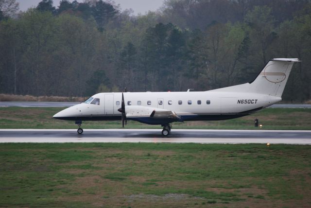 Embraer EMB-120 Brasilia (N650CT) - Rolling down runway 20 - 4/1/09