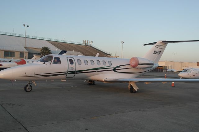 Cessna Citation CJ3 (N213F) - Parked at Oakland International Airport in Oakland, California on April 12, 2015.