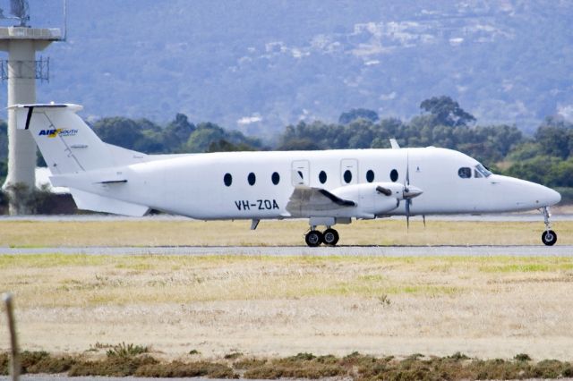 Beechcraft 1900 (VH-ZOA) - On taxi-way heading for take off on runway 05. Friday 19th April 2013.