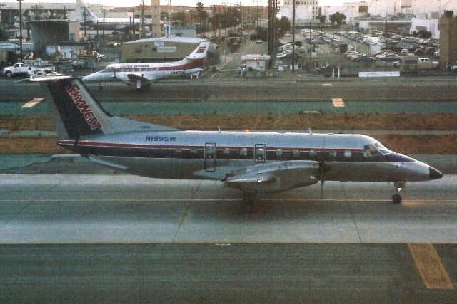 Embraer EMB-120 Brasilia (N199SW) - Seen here on 13-Jun-97.br /br /With Skywest Airlines from May-91 to Aug-04. Registration cancelled 6-Dec-05. Broken up at KMZJ.