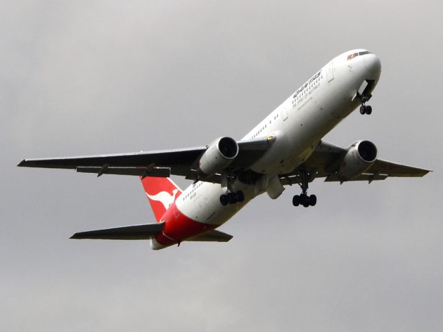 BOEING 767-300 (VH-ZKF) - Getting airborne off runway 23 on a cold, gloomy winters day. Wednesday 4th July 2012.