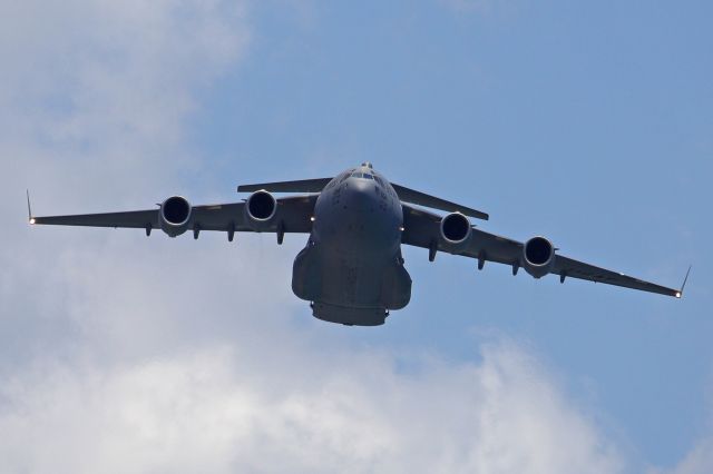 Boeing Globemaster III (97-0041) - Hope you all had a wonderful Independence Day. This Boeing C-17 Globemaster III flew down the coastline over Ocean Isle Beach, NC as part of Salute from the Shore. TURTLE4, (97-0041) from Joint-Base Charleston and a pair of F-16’s from Shaw AFB flew low over the North & South Carolina coastline yesterday afternoon. 