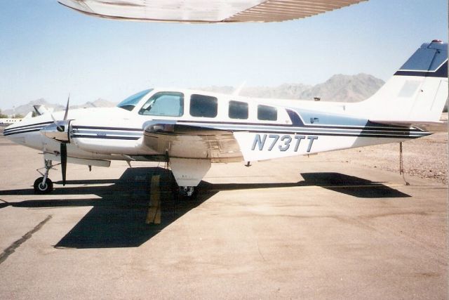 Beechcraft Baron (58) (N73TT) - Seen here in Oct-98.  Since reregistered N444SB then N958CC 22-Mar-08.