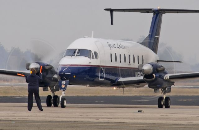 Beechcraft 1900 (N169GL) - Katherine marshalls "The Mighty Beechcraft 1900" from the passenger terminal at Merced Regional Airport (KMCE)