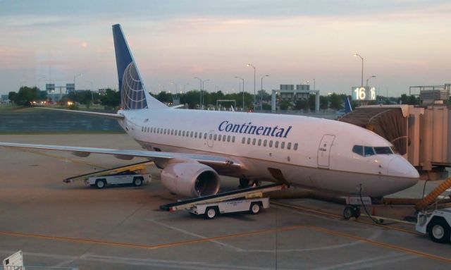 Boeing 737-700 (N16709) - CO 737-724 N16709 at the gate in the early morning hours at AUS on August 29, 2009.