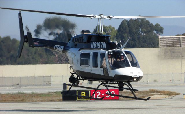 Bell JetRanger (N6197N) - Hovering to display area