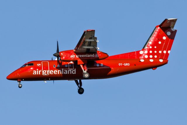 de Havilland Dash 8-200 (OY-GRO) - GL710 from Nuuk arriving at Keflavik in the evening light.  A plane that's hard to miss.