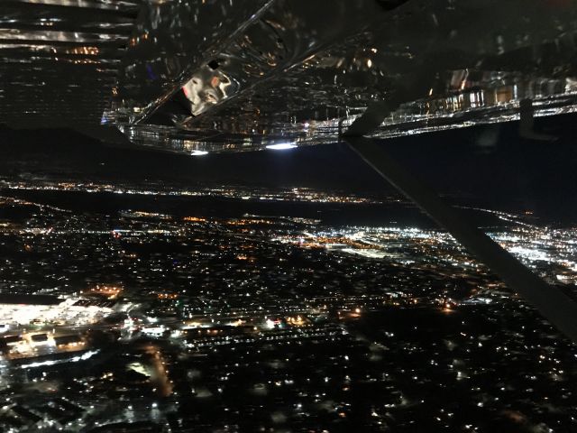 Cessna Skywagon 180 (N14PL) - Note the Rod Serling image in reflection. Left downwind for landing at Montgomery Field, San Diego.