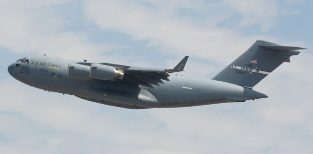 06-6156 — - My third post for today is another "Thunderbird-related" shot that was taken just around the same time that the team was arriving at RNO.  This early afternoon shot of the Travis-based C17A Globemaster "Spirit Of Golden Bear" (which is the first photo of 06-6156 to be posted into the FA gallery) shows it on the climb away from RNOs runway 34L.  "Golden Bear" had delivered the Thunderbirds support personnel and equipment and was departing just as the team came overhead to circle around for landing.