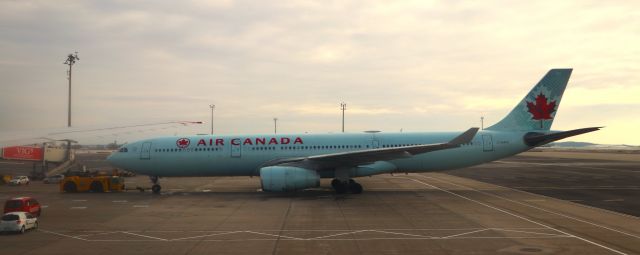 Airbus A330-300 (C-GHKX) - 12/7/23 pushback from the gate