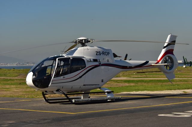 Eurocopter EC-120 Colibri (ZS-ROP) - An Airbus H120 (formerly known as Eurocopter EC120) resting after a scenic flight around Cape Town City for Cape Town Helicopters located on the waterfronts helipad.