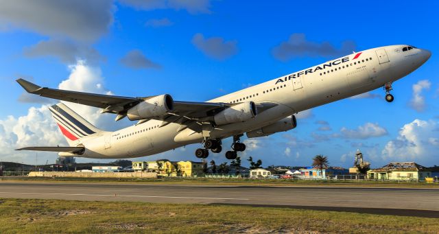 Airbus A340-300 (F-GLZK) - Air France departing TNCM St Maarten for Paris on a sunny afternoon.