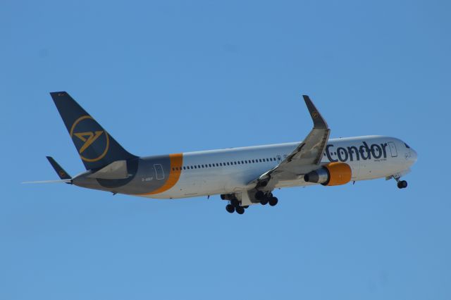 BOEING 767-300 (D-ABUF) - Condor departs KLAS to the North on a pretty windy Day. Photo Date 03/20/22