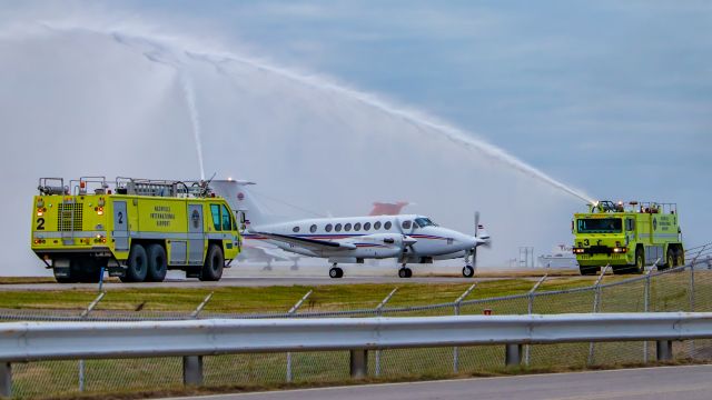 Beechcraft Super King Air 350 (N111M) - December 26, 2018 - Water cannon salute for 40-year pilot retiring.