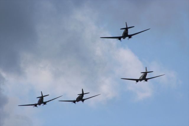 Douglas DC-3 (N88874) - Tight Flight of C-47's at Oshkosh '18 in cloudy skies just like Normandy '44. 