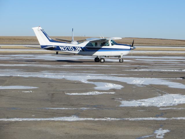 Cessna Centurion (N210JN) - Departing Front Range Airport.