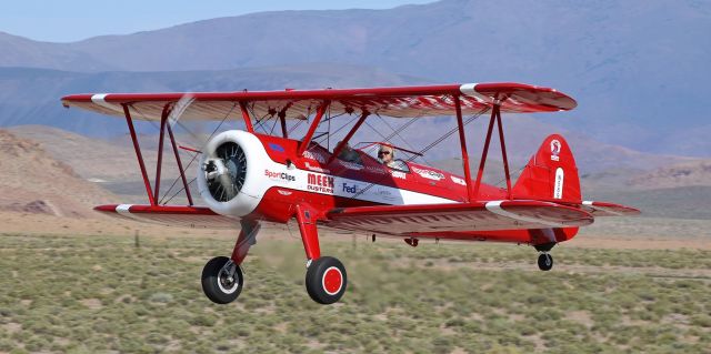 Boeing PT-17 Kaydet (N58986) - Another photo of the Ageless Aviation Dream Foundation's Boeing E-75 Stearman (N58986) as it climbs away from runway 15 at Fernley's Tiger Field to give a thrilling flight experience to a senior veteran. AADF provides flights to senior vets across the country absolutely free of charge.