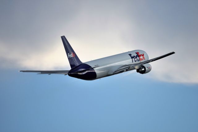 BOEING 767-300 (N273FE) - Heading off in to the weather