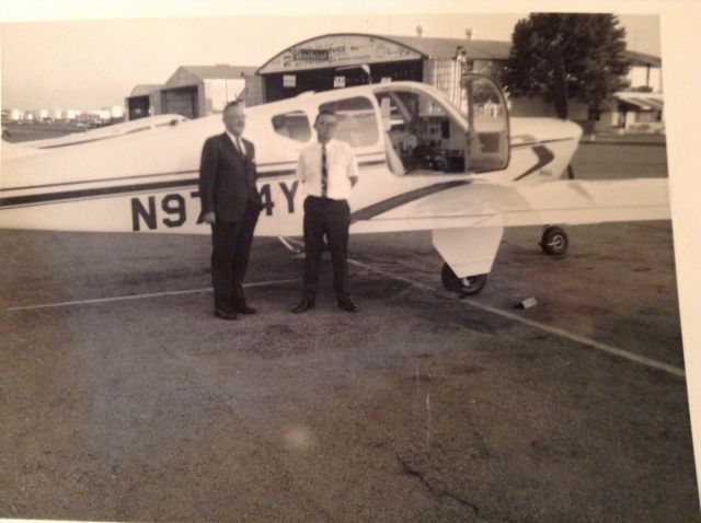 Beechcraft Bonanza (33) (N9704Y) - 1964 photo in front of Greensboro-High Point Air Service after airplane was delivered to new owner. Aircraft destroyed 8/23/2015 on approach to Eldorado, Arkansas. See NTSB report CEN15FA374