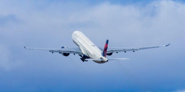 Airbus A330-900 (N409DX) - A Delta Airlines A330-900 taking off from PHX on 2/23/23. Taken with a Canon R7 and Canon 100-400 EF ii lens.