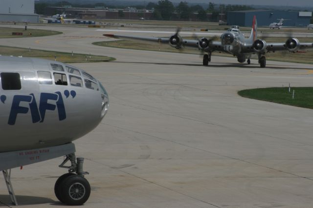 Boeing B-17 Flying Fortress — - EAA's B-17 Aluminum Overcast Taxi's Behind B-29 FIFI Outagamie Cty Airport