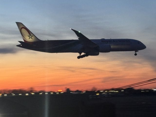 Boeing 787-8 — - April 20, 2025. Plane approaching runway 06W right after sunset.