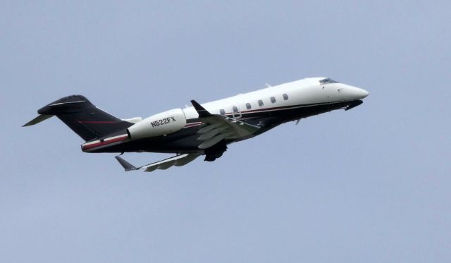 Bombardier Challenger 300 (N522FX) - Shortly after departure is this 2005 Bombardier Challenger 300 in the Spring of 2019.