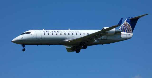 Canadair Regional Jet CRJ-200 (N930SW) - On final is this 2002 United Express Canadair Regional Jet 200LR from the Spring of 2021. 