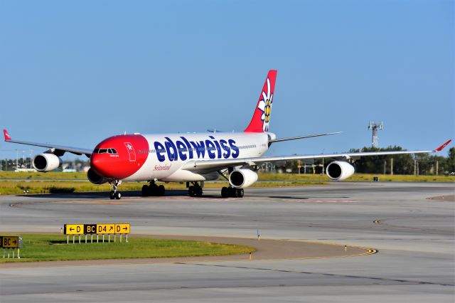 Airbus A340-300 (HB-JMD) -  Edelweiss Air Airbus A340-313 arriving at YYC on Aug 4.