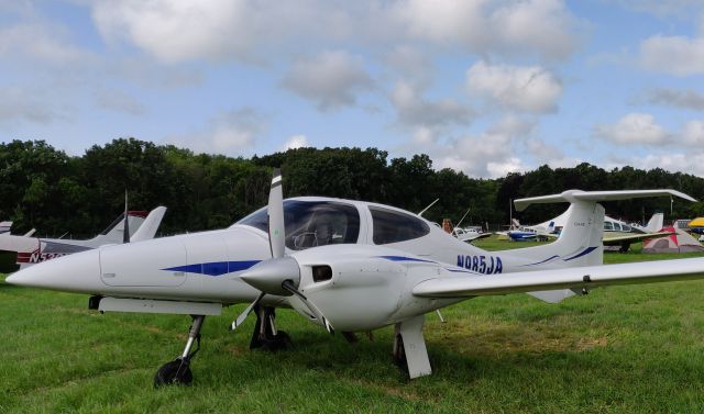 Diamond Twin Star (N985JA) - Parked at KOSH during EAA Airventure 2018.