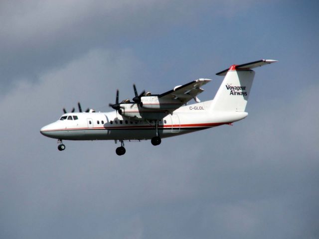 C-GLOL — - A rare sight these days, Dash-7 landing on 15L at CYYZ
