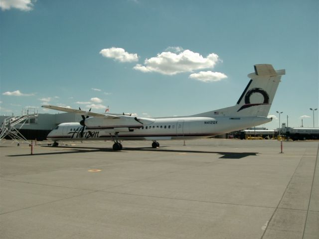 de Havilland Dash 8-400 (N412QX) - Spare Aircraft parked at Hardstand