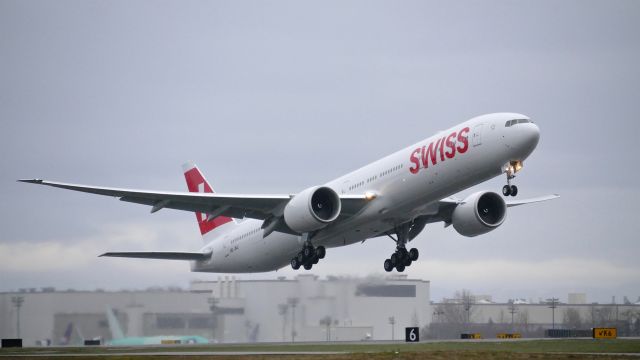 BOEING 777-300 (HB-JNJ) - SWR7531 on rotation from Rwy 16R to begin its delivery flight to ZRH / LSZH on 3.13.18. (ln 1545 / cn 62755). This is the 10th and final B777-300(ER) for SWISS.