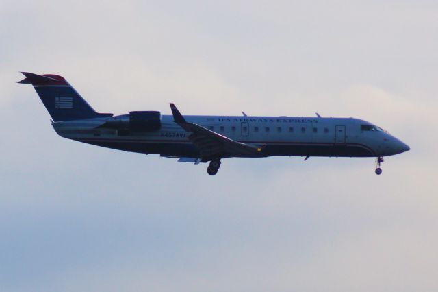 Canadair Regional Jet CRJ-200 (N457AW) - Taken from Fore River Parkway Trail, Portland, ME; landing at KPWM from KDCA.