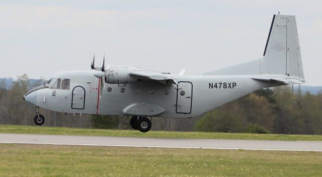 NURTANIO Aviocar (N478XP) - A CASA C-212-200 just prior to touchdown on Runway 24 at Northeast Alabama Regional Airport, Gadsden, AL - April 3, 2018.