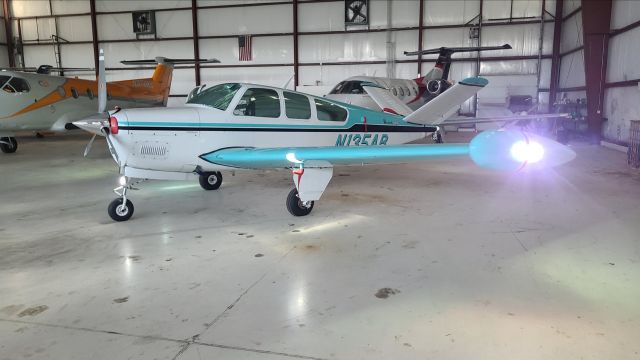 Beechcraft 35 Bonanza (N135AB) - Sitting in a hanger