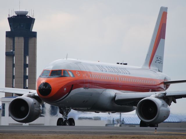 Airbus A319 (N742PS) - 18L - 2/23/10