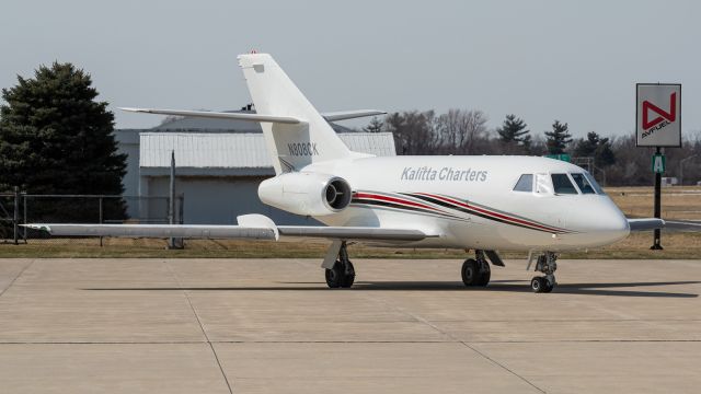 Dassault Falcon 20 (N808CK) - Kalitta Charters begins to taxi away from the FBO at KVPZ.