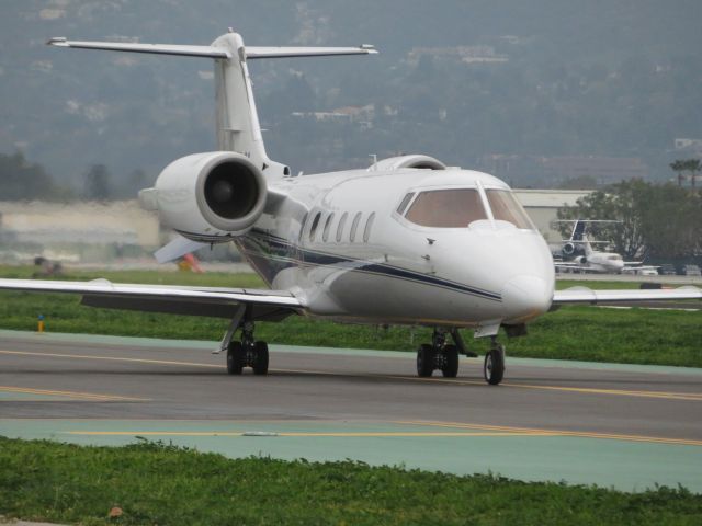 Learjet 60 (N975LV) - Taken at the observation area at Van Nuys Airport. This jet was on its way to Aspen, Colorado.