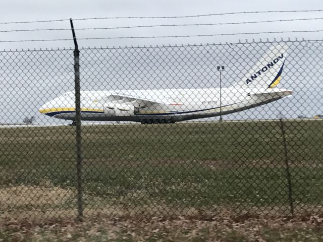 Antonov An-12 (UR-82073) - Had to snap a quick one when I saw this guy parked at general aviation in Kansas City, having just arrived from Guam.