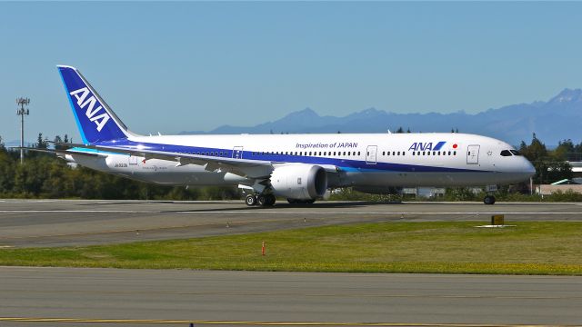 Boeing 787-9 Dreamliner (JA833A) - BOE198 begins a fast taxi test on Rwy 34L after returning from its maiden flight on 9/12/14. (LN:202 / cn 34524).