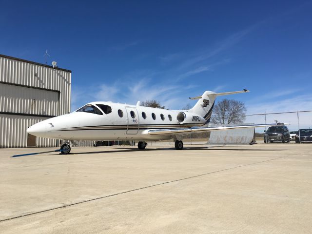 Beechcraft Beechjet — - Nextant N1PU resting outside Hangar 5 on a beautiful spring day.