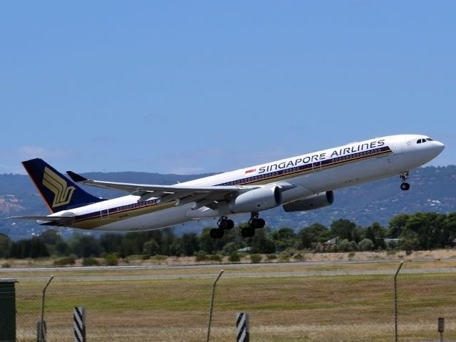 Airbus A330-300 (9V-STR) - Getting airborne off runway 23 and heading home to Singapore.. Wednesday 4th January 2012.