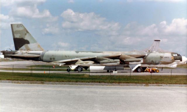 Boeing B-52 Stratofortress (57-6477) - I was researching the history of the 42nd Bombardment Wing at Loring when I inadvertently stumbled across a photo of an aircraft I thought I'd photographed many, many years ago. The photo I came across on the web had been taken at AMARC in 2014, and there wasn't much left of the aircraft shown in that pic, but the USAF reg sounded familiar so I went digging into my old print pics. And I found what I was looking for .....br /The pic I found was somewhat faded. I scanned it on my tabletop scanner and then briefly considered converting it to B & W. But if I had converted it, the camo paint would only have appeared in grayscale, and I've always liked this shot because the camo scheme is so diverse. So I used PS to resurrect the color a bit and here is the result.br /This photo print, clicked in the 80s, captured 57-6477, a B-52G that had been converted to a JB-52G by the time I snapped this shot, on the maintenance ramp at Loring AFB, Maine (42nd Bombardment Wing - Heavy).br /Only a few short years after I took this picture, 57-6477 went to the boneyard. In September of 1990, twenty-nine years ago last month, it went to Davis Monthan. The photo I stumbled across earlier today (the one taken in 2014) showed the dismembered remnants of this once-powerful warbird. I prefer to remember it as seen in my decades-old picture here.