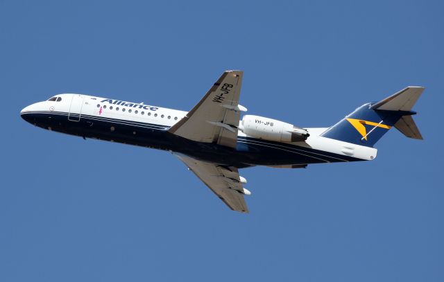 Fokker 70 (VH-JFB) - Departing Rwy 01R