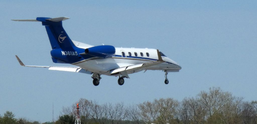 Embraer Phenom 300 (N361AS) - On short final is this 2015 Embraer Phenom 300 in the Spring of 2022.